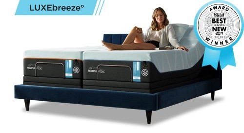 LuxeBreeze mattress on an adjustable base with Popular Science's Best of What's New award badge