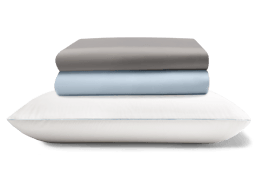 Pillows and sheets stacked