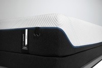 The corner of a tempur-proadapt soft mattress