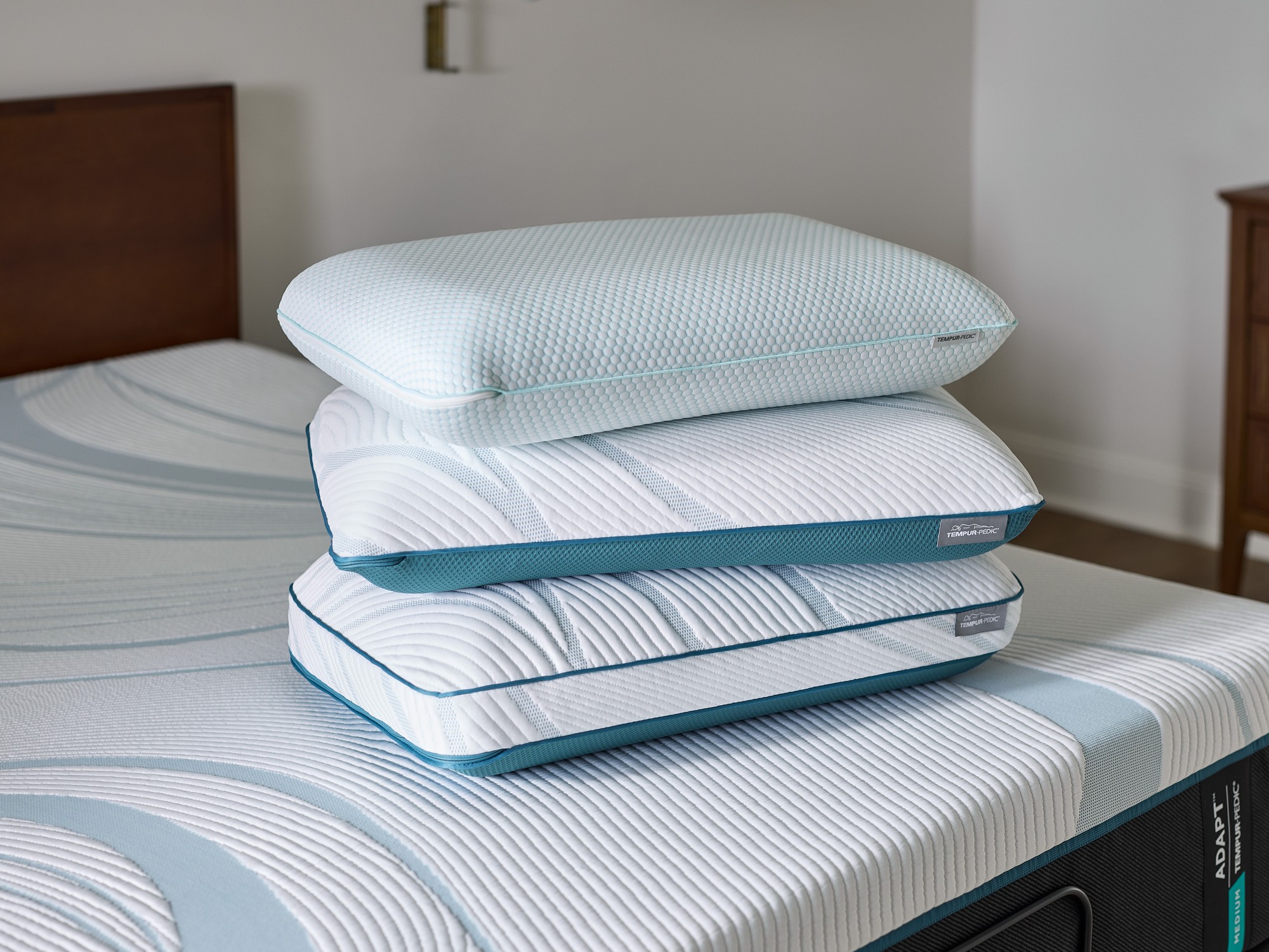 a stack of adapt pillows