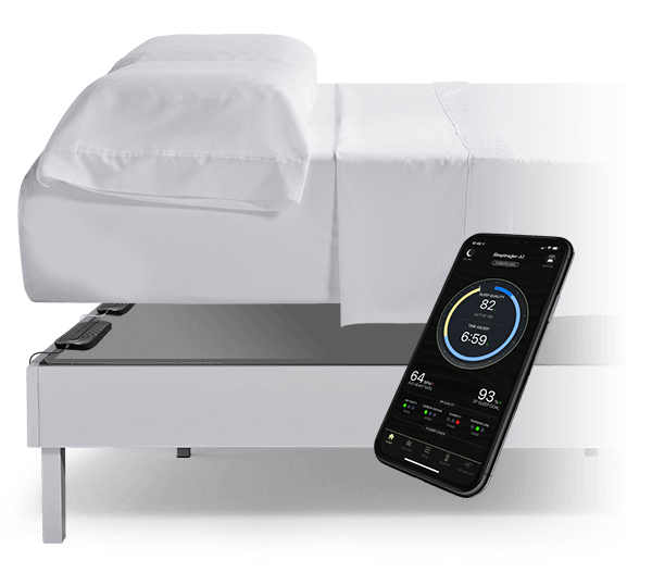 2 Sleeptracker sensors placed underneath a mattress shown with a smart phone and sleeptracker app