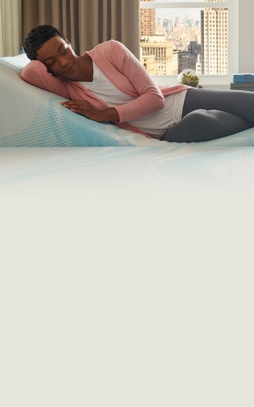 Woman sleeping on her split-king Tempur mattress
